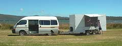 Our Minibus with our custom made trailer.